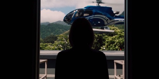 Bryce Dallas Howard's character Claire who is waiting for an arrival on the Isla Nublar hellipad